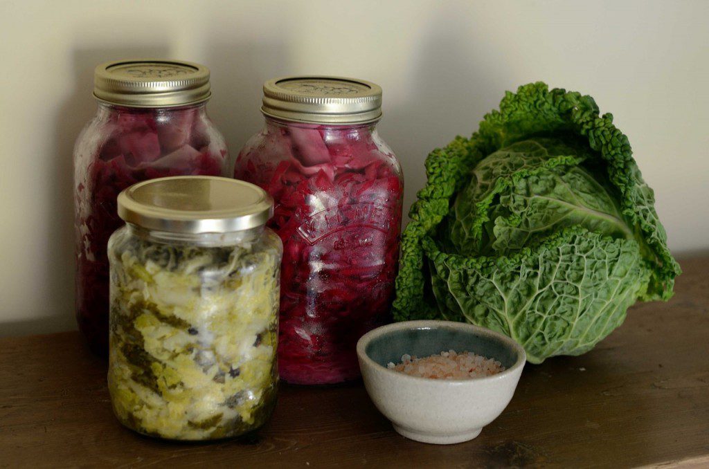 fermented sauerkraut in jars to support a healthy gut