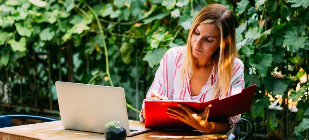 blond woman studying nutrition online