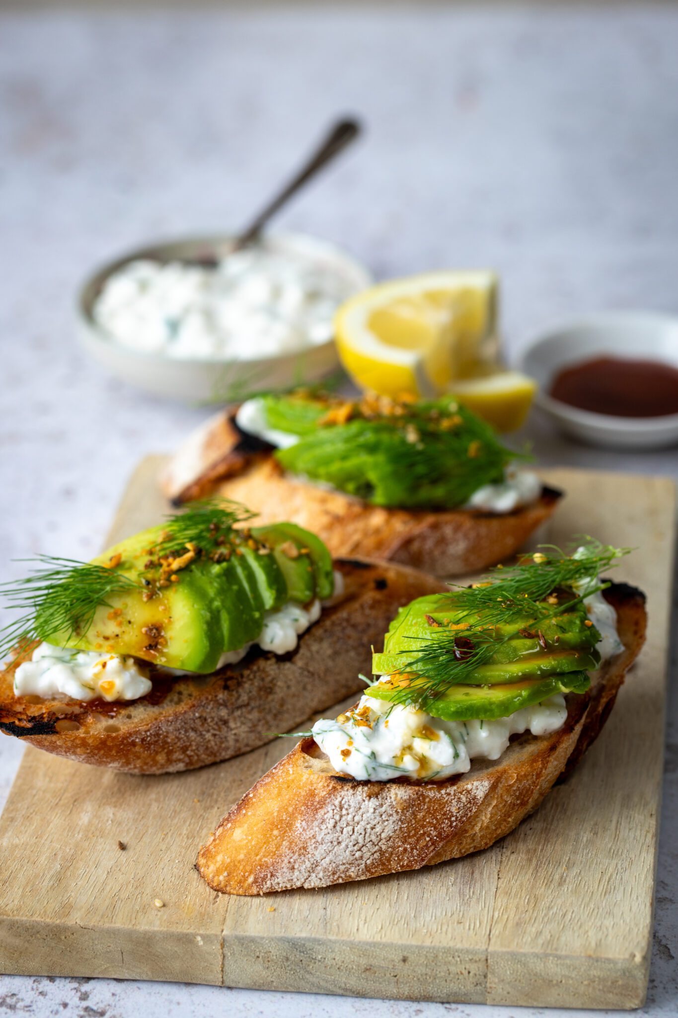 Cottage Cheese and Avocado Breakfast Bruschetta with Dukkah and Manuka Honey Drizzle
