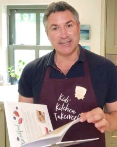 Oliver McCabe with Kids Kitchen Takeover Cookbook